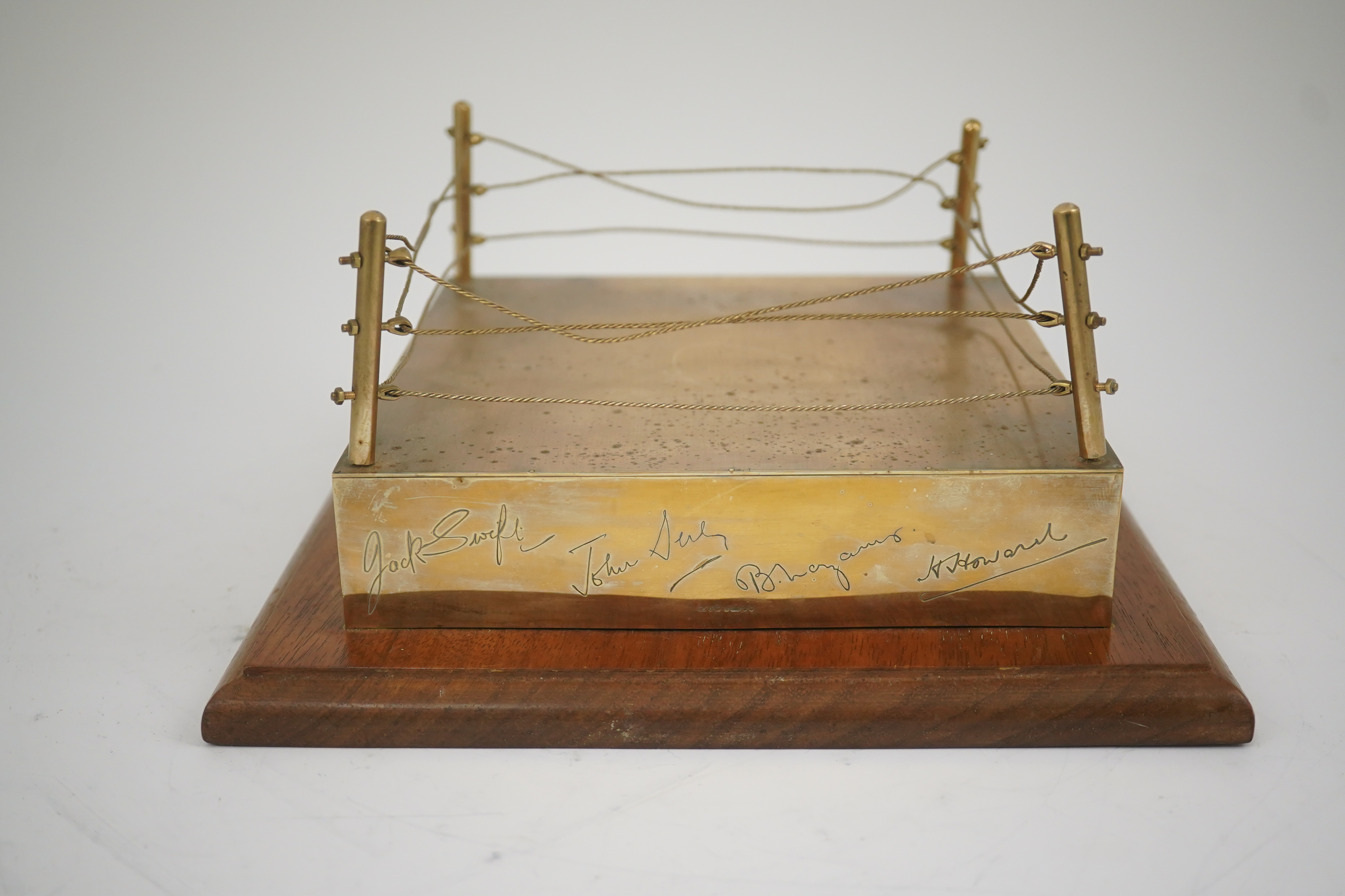 A late 1960's 9ct gold mounted Golden Wedding gift, presented to Jack & Fay Solomons from the Directors of World Sporting Club, modelled as a boxing ring